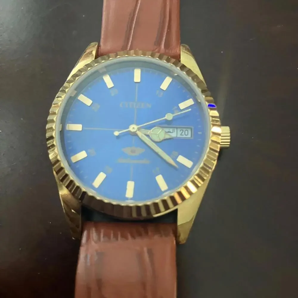 Citizen Gold Watch with Blue Dial and Tan Strap
